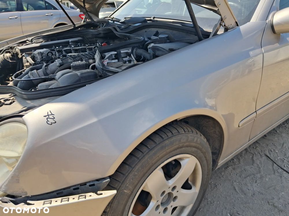BLOTNIK LEWY PRZOD MERCEDES E KLASA W211 723 - 4
