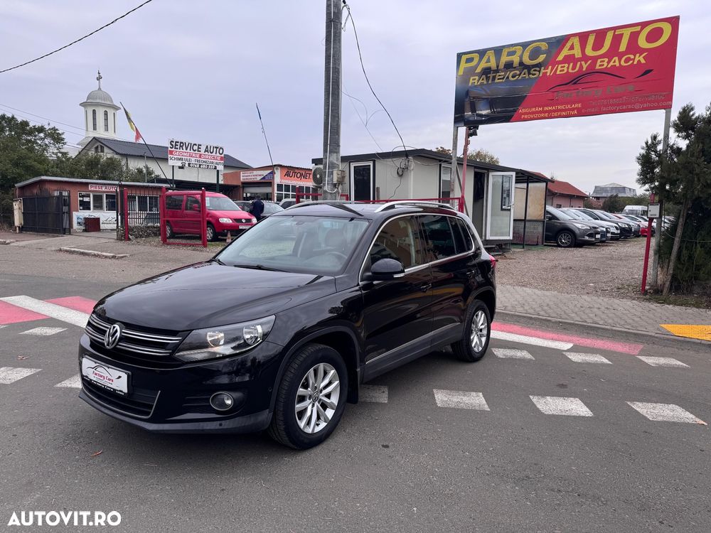 Volkswagen Tiguan 1.4 TSI 4Motion Exclusive - 1