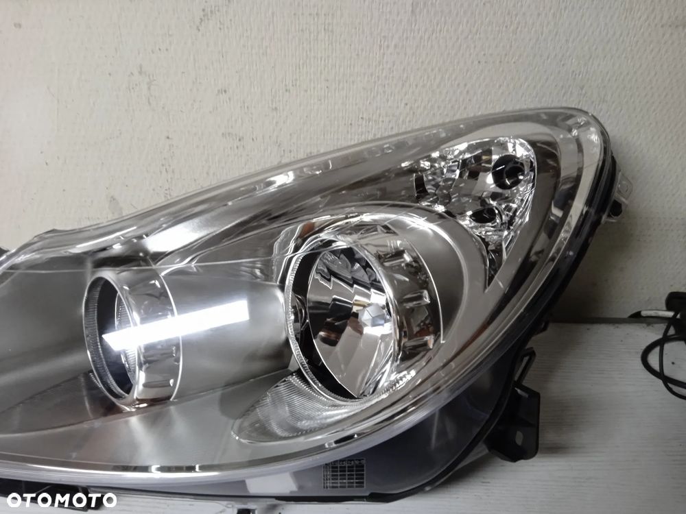 REFLEKTOR OPEL CORSA D LEWY LUB PRAWY NOWY - 3