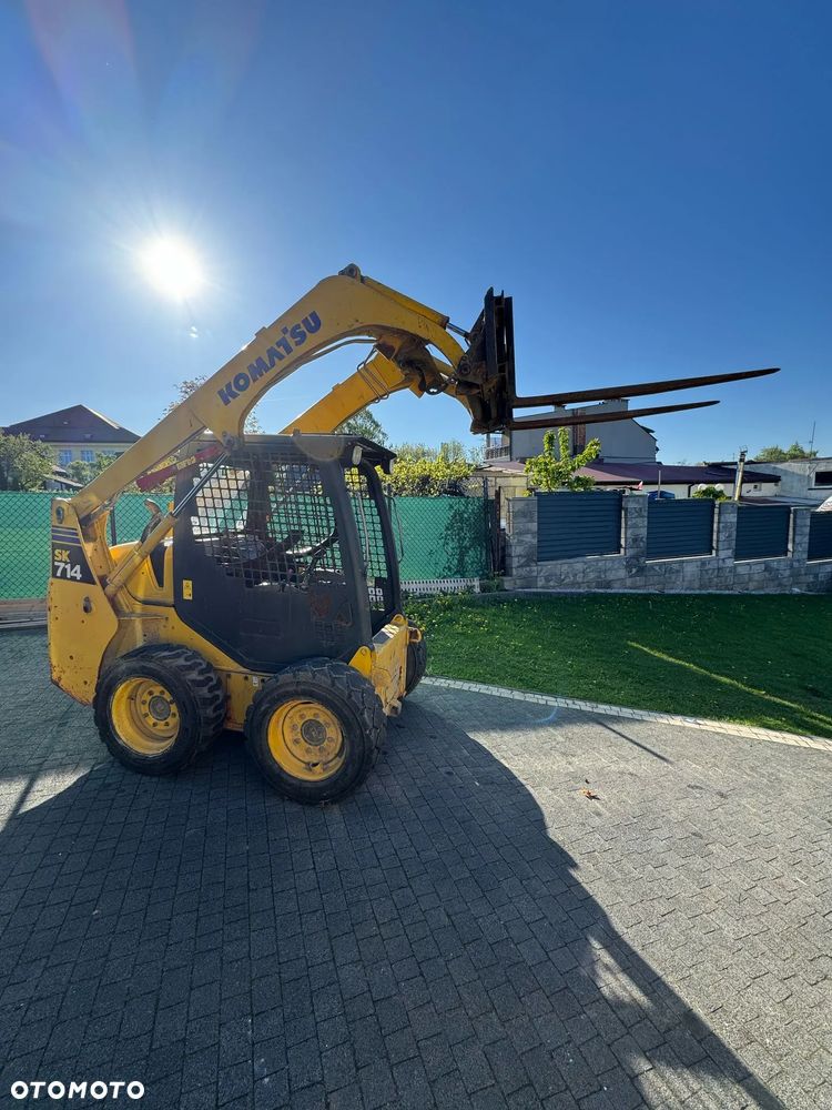 Komatsu SK714 - 1