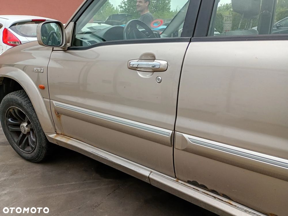 SUZUKI GRAND VITARA XL7 LIFT 04-06 LAMPA TYŁ TYLNA PRAWA LEWA - 18