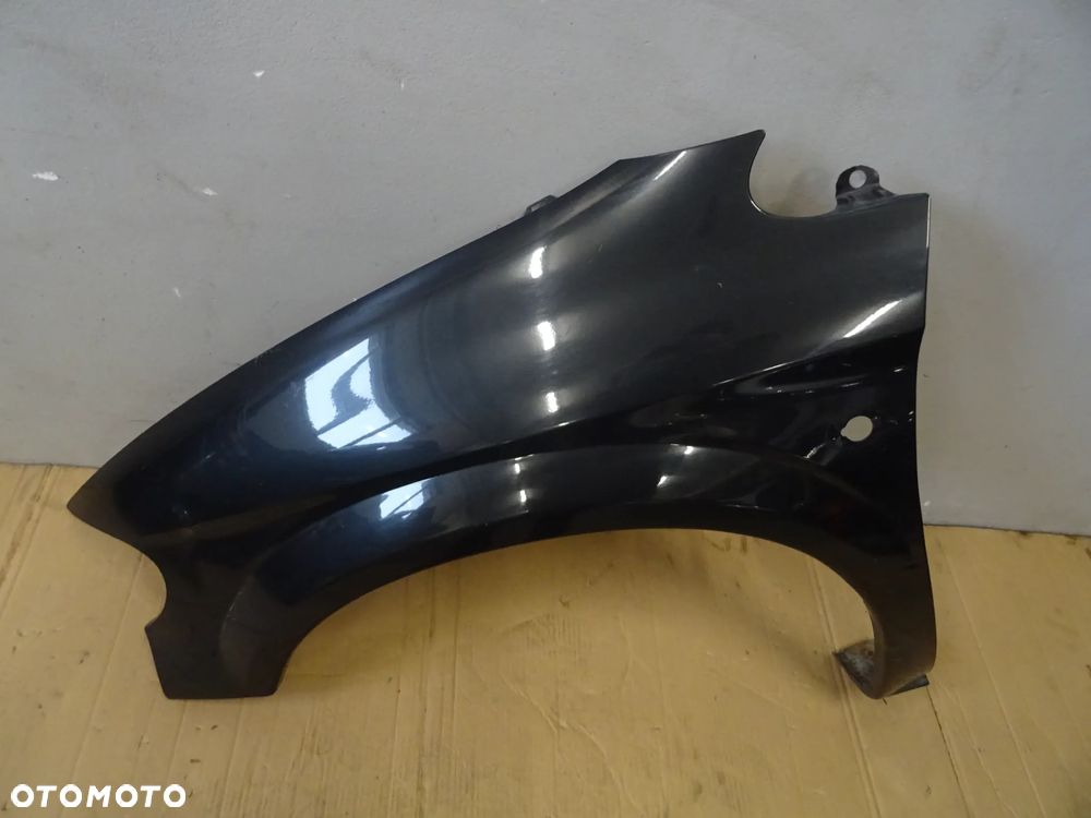 BŁOTNIK LEWY PRZÓD PRZEDNI CHRYSLER VOYAGER IV NR23 - 1