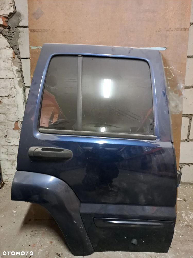 Drzwi JEEP LIBERTY 02-12' prawy tył (granatowe) - 1