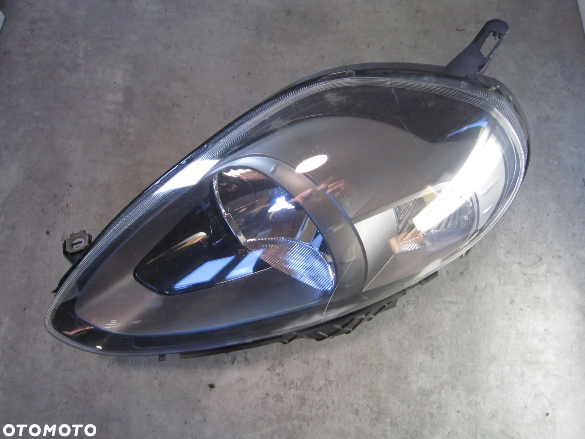 Lampa przód przednia lewa Fiat Punto Evo Lift Angilk - 1