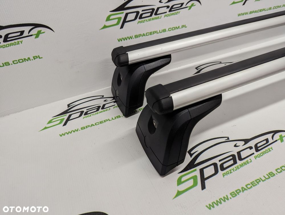 Bagażnik dachowy Thule: belki 861 + Stopy 751 + kit - 2