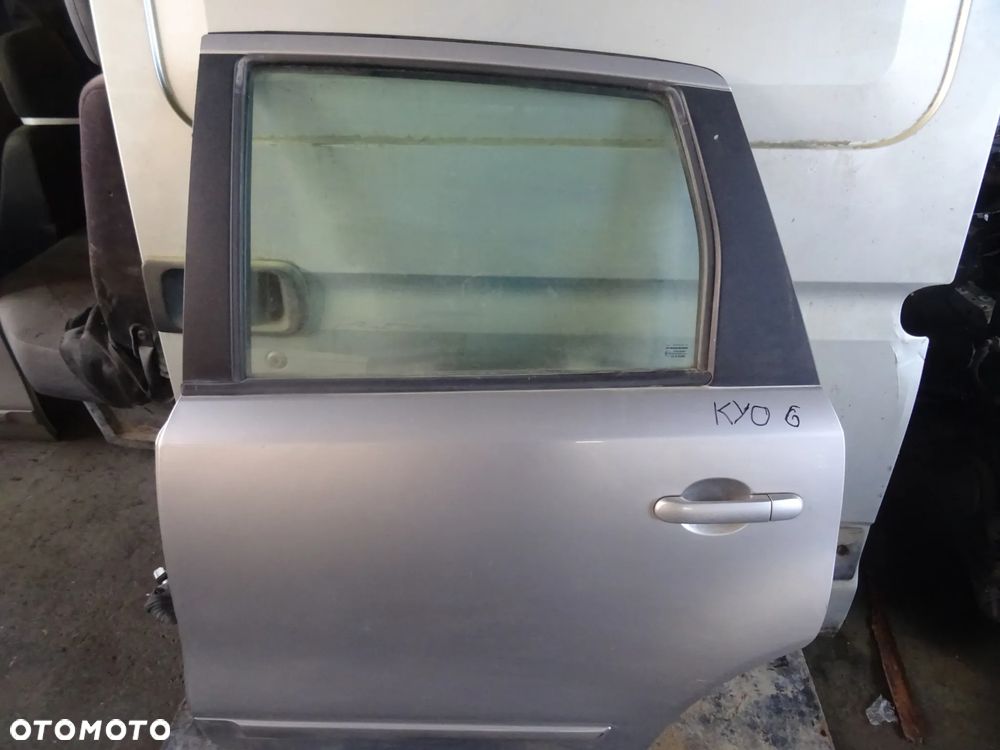 Drzwi Nissan Note Lakier(KYO G) Lewy tył - 1