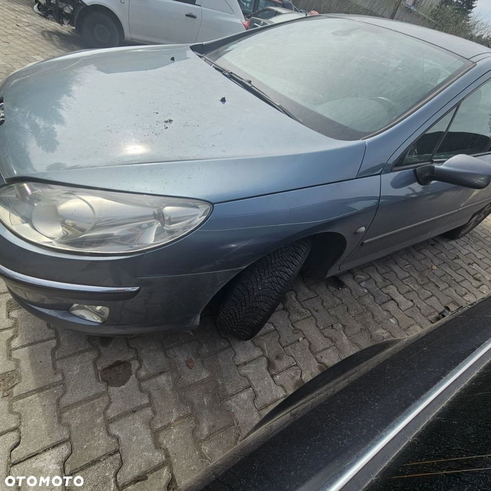 BŁOTNIK / PRZÓD PRAWY LEWY  / PEUGEOT 407 (2004r),  kod lak: EZWD - 2