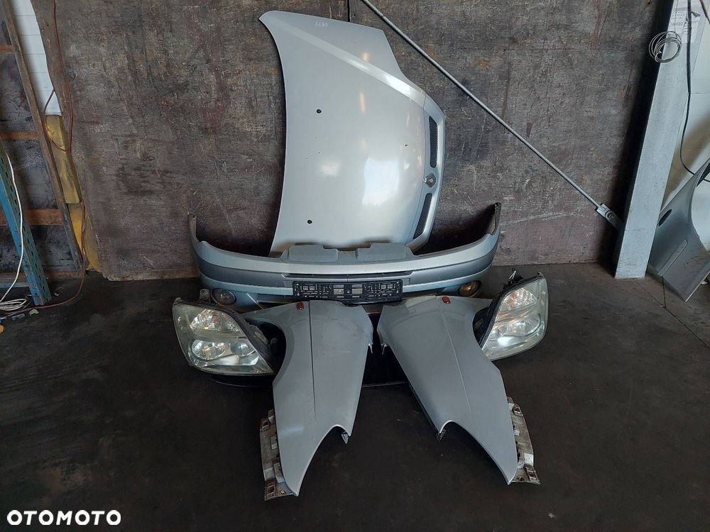 KOMPLETNY PRZÓD MASKA ZDERZAK BŁOTNIKI LAMPY SCENIC I LIFT MV632 - 1