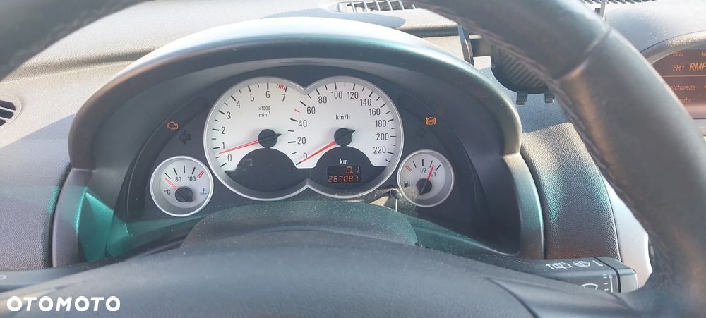 Opel Corsa 1.2 16V Enjoy - 10