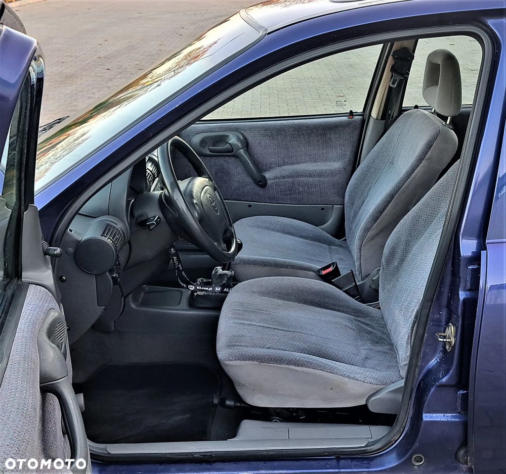 Opel Corsa 1.4 16v - 9