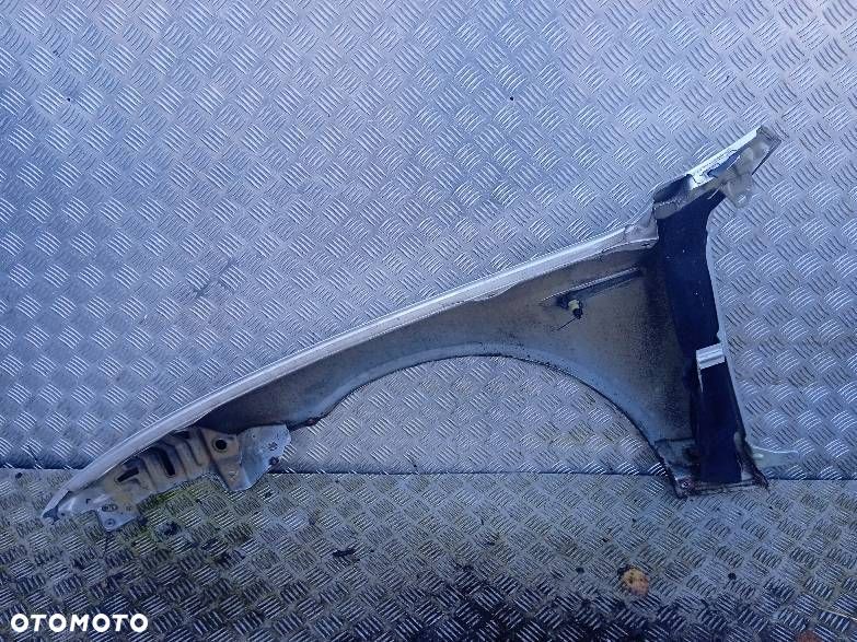 BŁOTNIK PRAWY PRZEDNI ALFA ROMEO 159 - 2