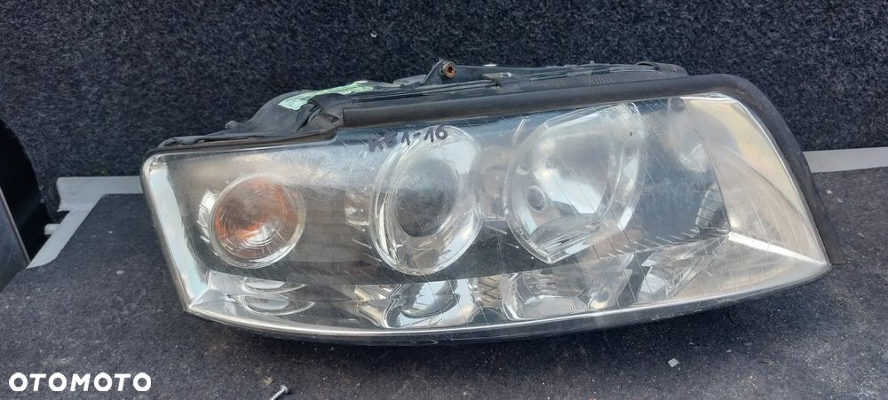 .  PRZOD PRZEDNIA LAMPA PRAWA AUDI A4 B6 - 1