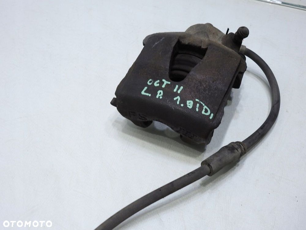 ZACISK HAMULCOWY LEWY PRZÓD SKODA OCTAVIA II - 4