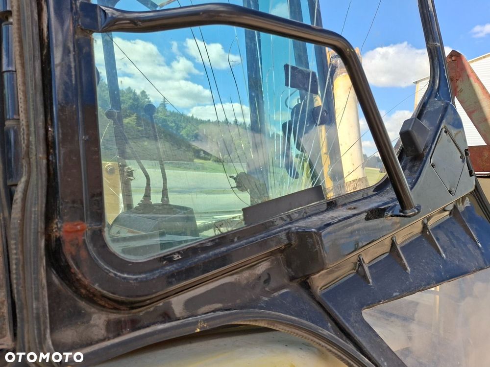 Caterpillar 428D 4X4 - 11