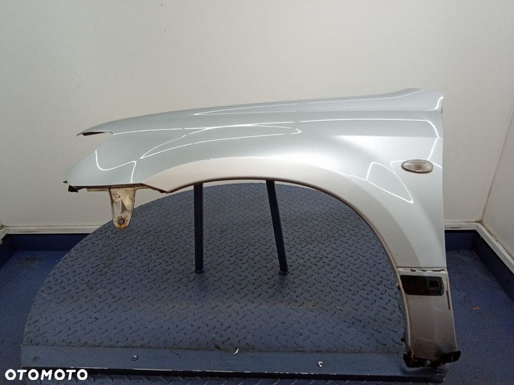 OUTLANDER I 03- BŁOTNIK PRZÓD LEWY PRZEDNI A31A - 1