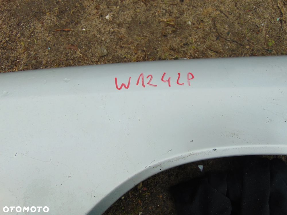 Błotnik Mercedes w124