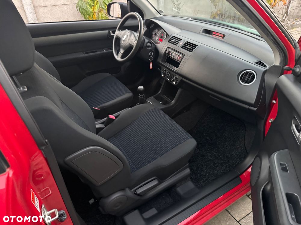 Suzuki Swift 1.3 Club - 9