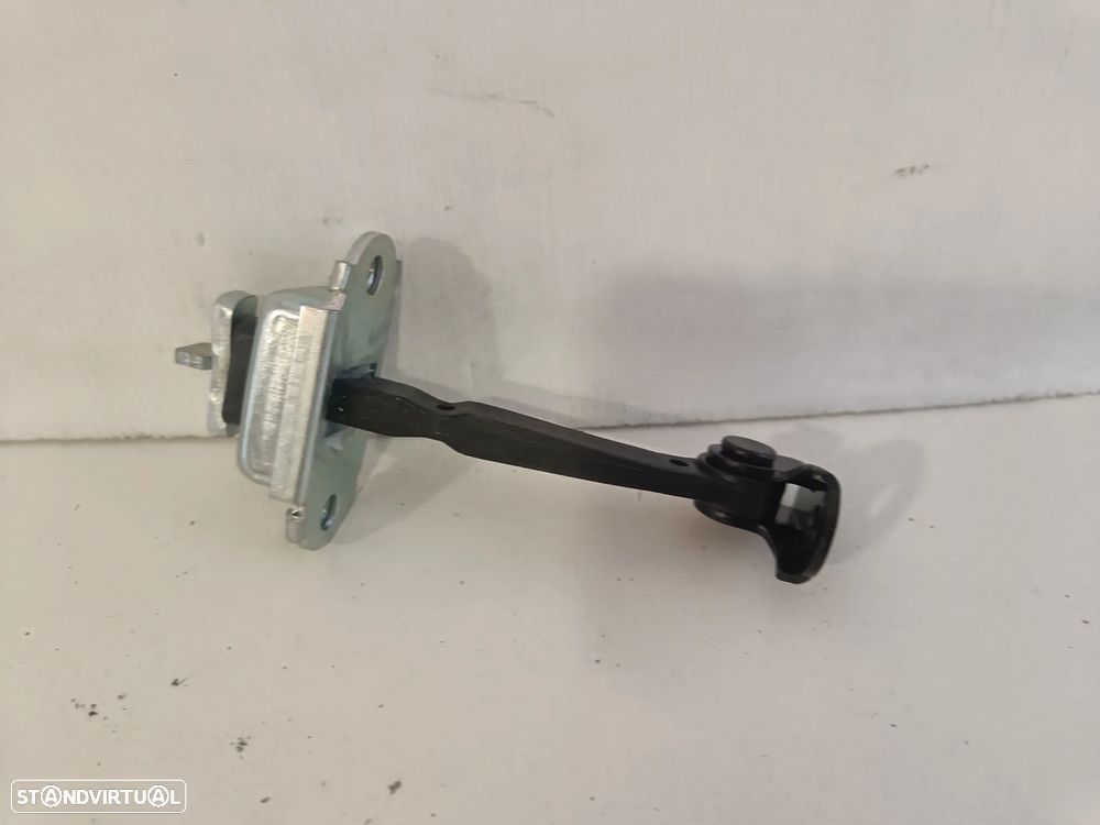 Limitador dobradiça esticador porta frente Toyota Yaris 1999 a 2004 (novo) - 1
