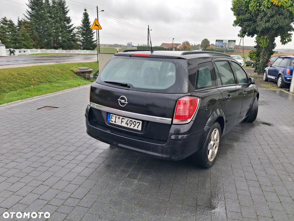 Opel Astra 1.6 Caravan - 12