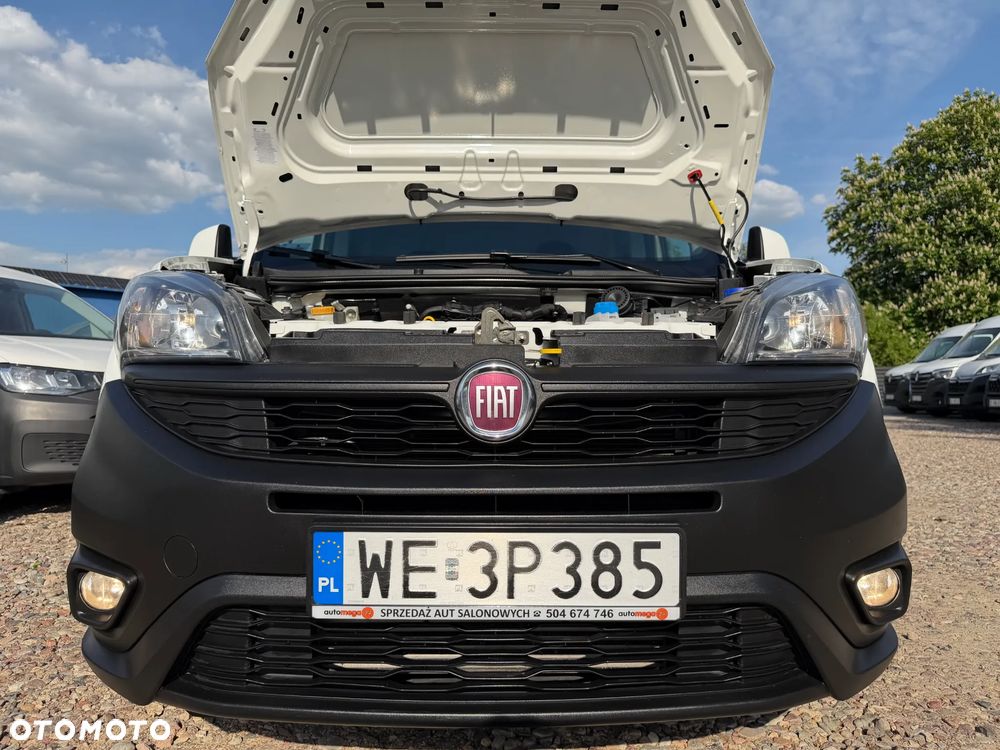 Fiat DOBLO VAN VAT-1 Homologacja cięż. DMC: 2145kg Ładowność 706kg MOCNY SILNIK 1.6 MultiJet, 105KM Emisja Euro-6, Skrzynia biegów 6-cio stopniowa! ORYGINALNA ZABUDOWA PAKI, BOCZNE DRZWI PRZESUWNE, RADIO FABRYCZNE, Hak 1300kg, PODGRZEWANE FOTELE Z REG. I PODŁOKIETNIKIEM, BAGAŻNIK DACHOWY ORYGINALNY FIAT, PARKTRONIKI, ALARM.. - 26