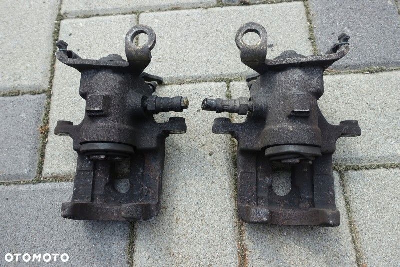 ZACISK LEWY PRAWY TYŁ FORD FOCUS MK1 - 2
