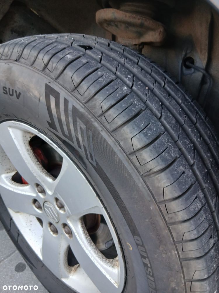 Suzuki Grand Vitara 2.0 - 12