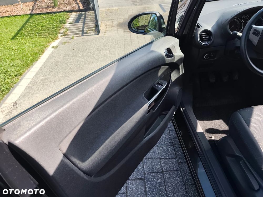 Opel Corsa 1.2 16V Enjoy - 11