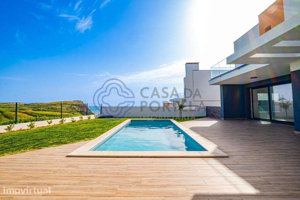 Moradia T4 com vista mar, piscina privada, 3 suítes e construção 2025. - Grande imagem: 2/55