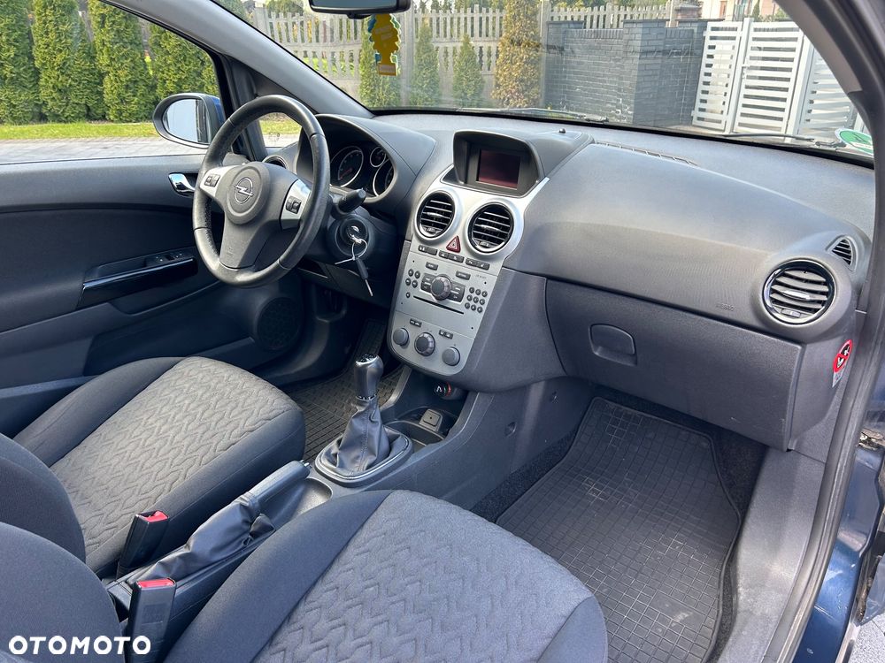 Opel Corsa 1.4 16V Active - 11