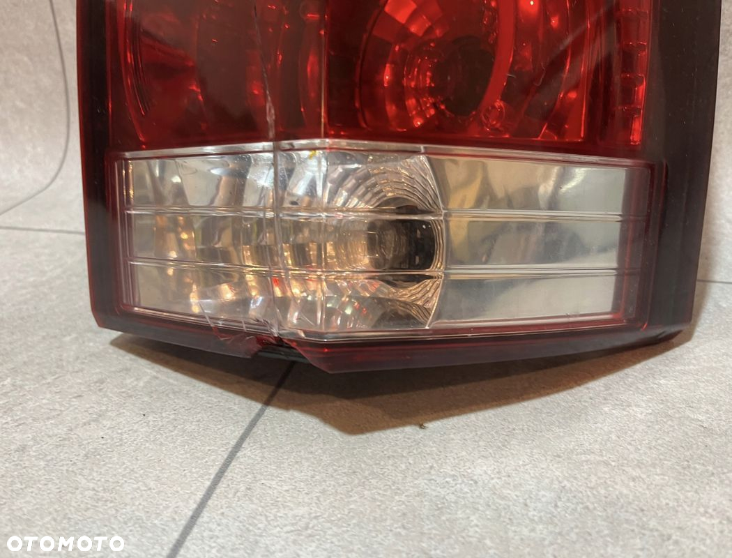 JEEP COMMANDER XK LAMPA WIĄZKA WKŁAD EU USZKODZONA - 2
