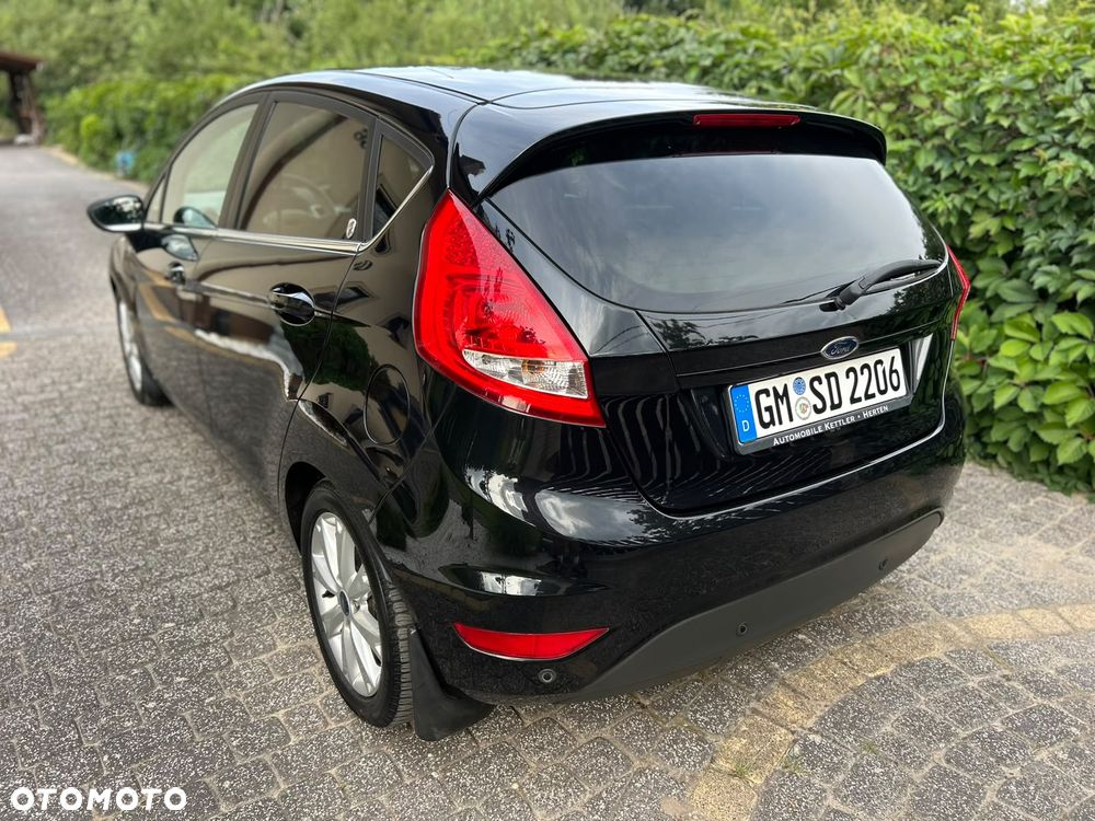 Ford Fiesta 1.4 Ghia - 11