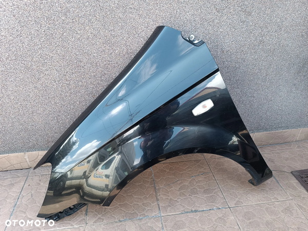 Hyundai Getz FL LIFT (2006-2010) błotnik Lewy Prawy przód przedni Czarny kod lakieru EB