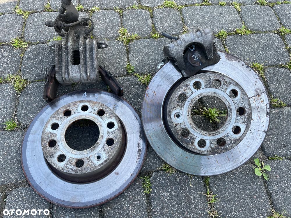 Tarcze x2 + klocki ZACISK HAMULCOWY LEWY PRAWY A3 8P OCTAVIA II GOLF V TYŁ KOMPLET - 1