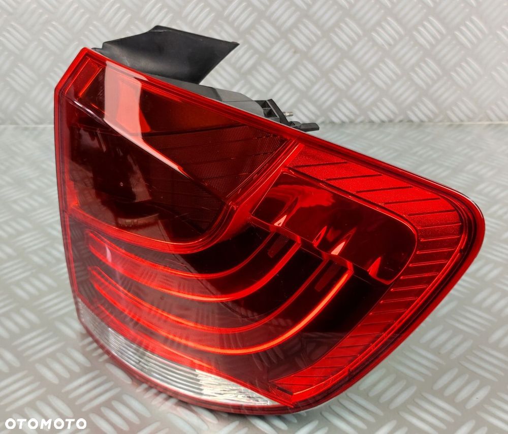 03.424.50 lampa prawa prawy tył tylna w błotnik BMW X1 E84 2009-2015 EUROPA - 3