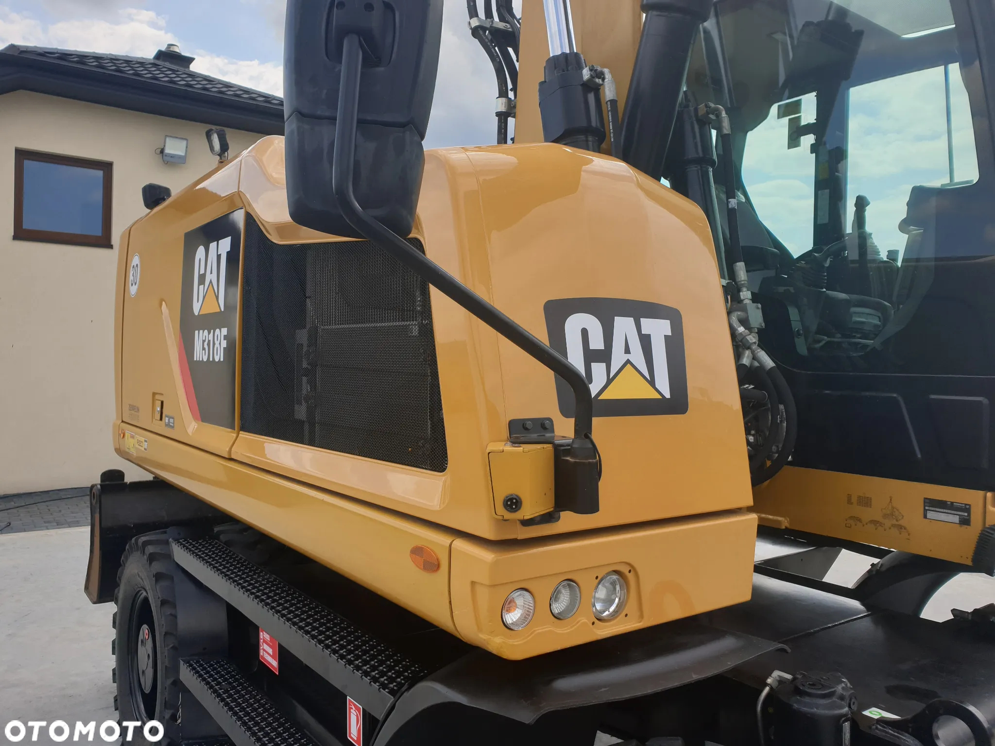 Caterpillar M 318 F ROTOTILT SPROWADZONY ŁADNY STAN - 9