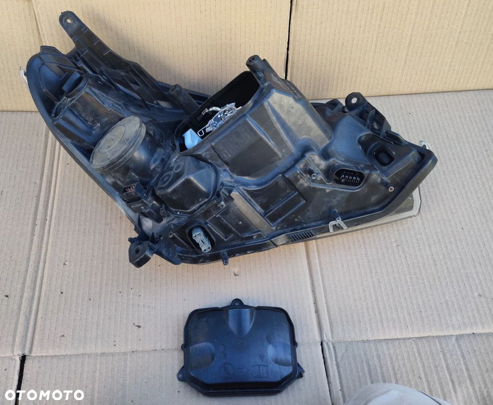 Bi-Xenon lewy Lampa lewa Opel Astra H 2003- - 5