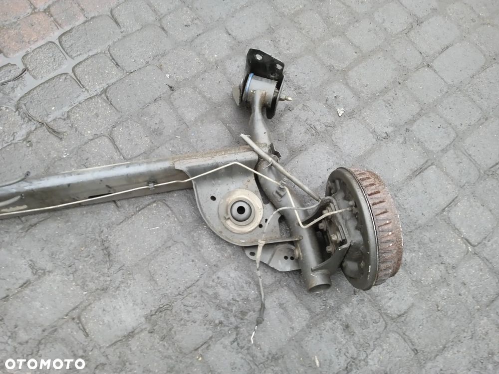 BELKA TYLNEGO ZAWIESZENIA DACIA LOGAN MCV 12-21 1.5 DCI - 4