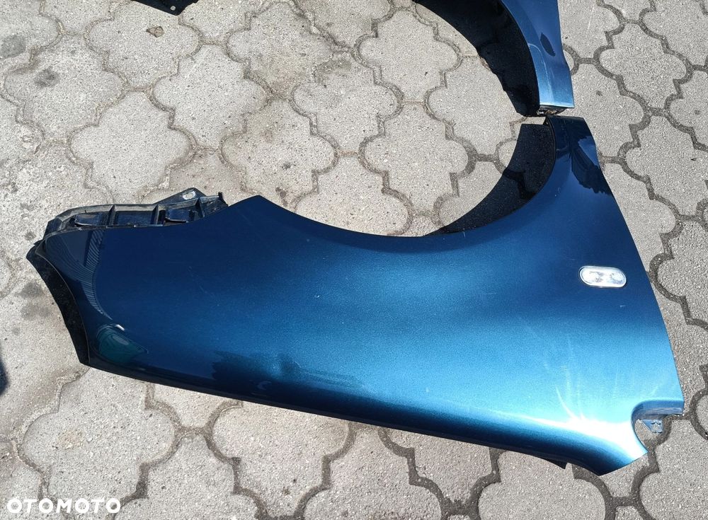 Polo 9N błotnik przedni przód przed lift niebieski PRAWY Volkswagen