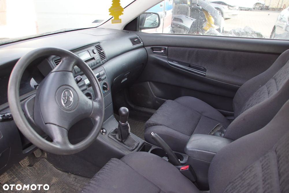 Auto na części - Toyota Corolla E12 1.4 VVT-i 97 KM 4ZZ-FE MTM 1C3 2002R Silnik Skrzynia Drzwi Maska Klapa Zderzak Błotnik Szyba Klamka Lampa Lusterko Deska Kokpit Sterownik Moduł Czujnik Licznik Panel Kierownica - 9
