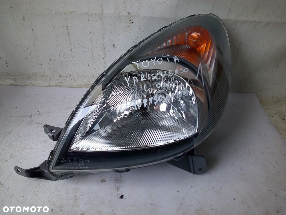 toyota yaris verso lampa przód lewa przednia nowa oryg - 9