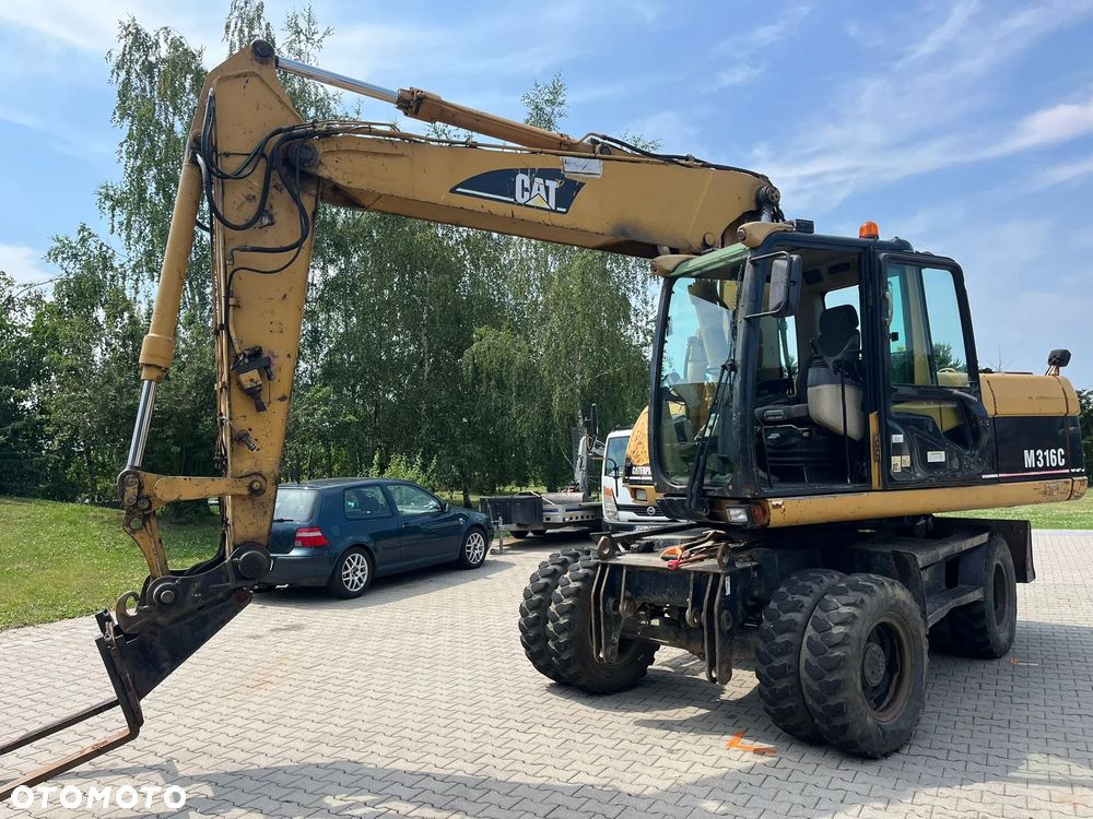 Caterpillar m316c - 4