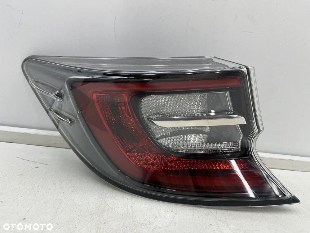 Lampa Toyota Corolla XII E21 18-22r. HB hatchback NOWA lewa tylna LED w błotnik EU Oryginalna lewy t - 1