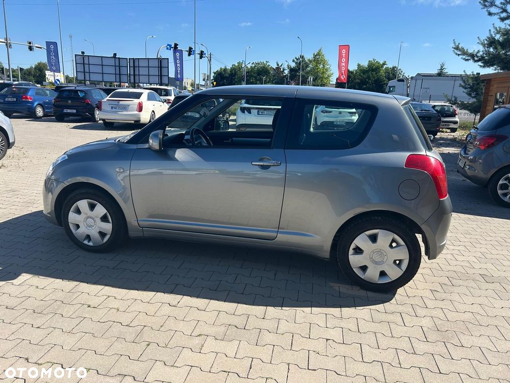 Suzuki Swift 1.3 Club - 11