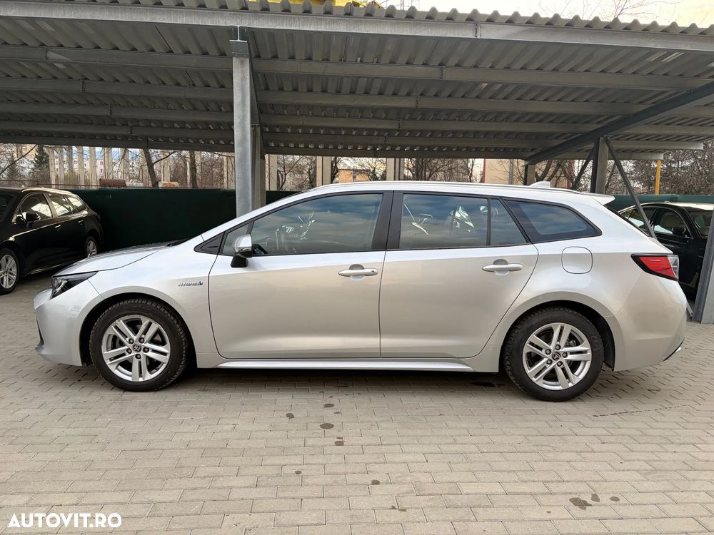 Toyota Corolla 1.8 HSD Business - 8