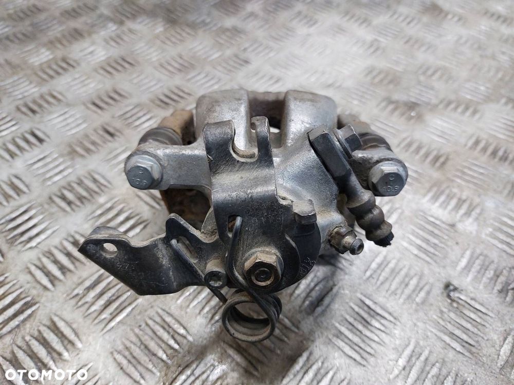 ZACISK HAMULCOWY LEWY TYŁ OPEL ASTRA H ZAFIRA B - 2