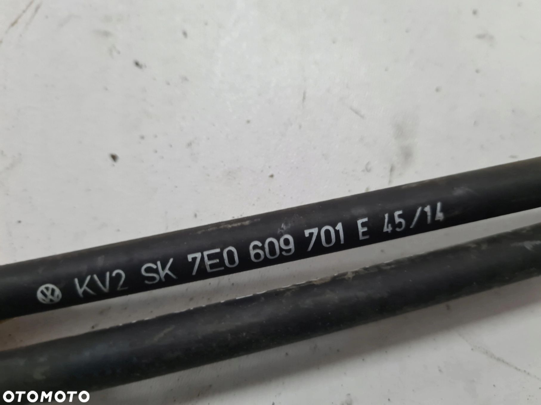 VW T5 linka cięgno hamulca ręcznego 7E0609701E - 2