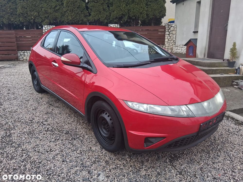 Honda Civic 1.4i-DSi Comfort - 1