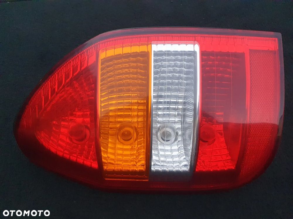 OPEL ZAFIRA A LAMPA LEWY TYŁ TYLNA - 1