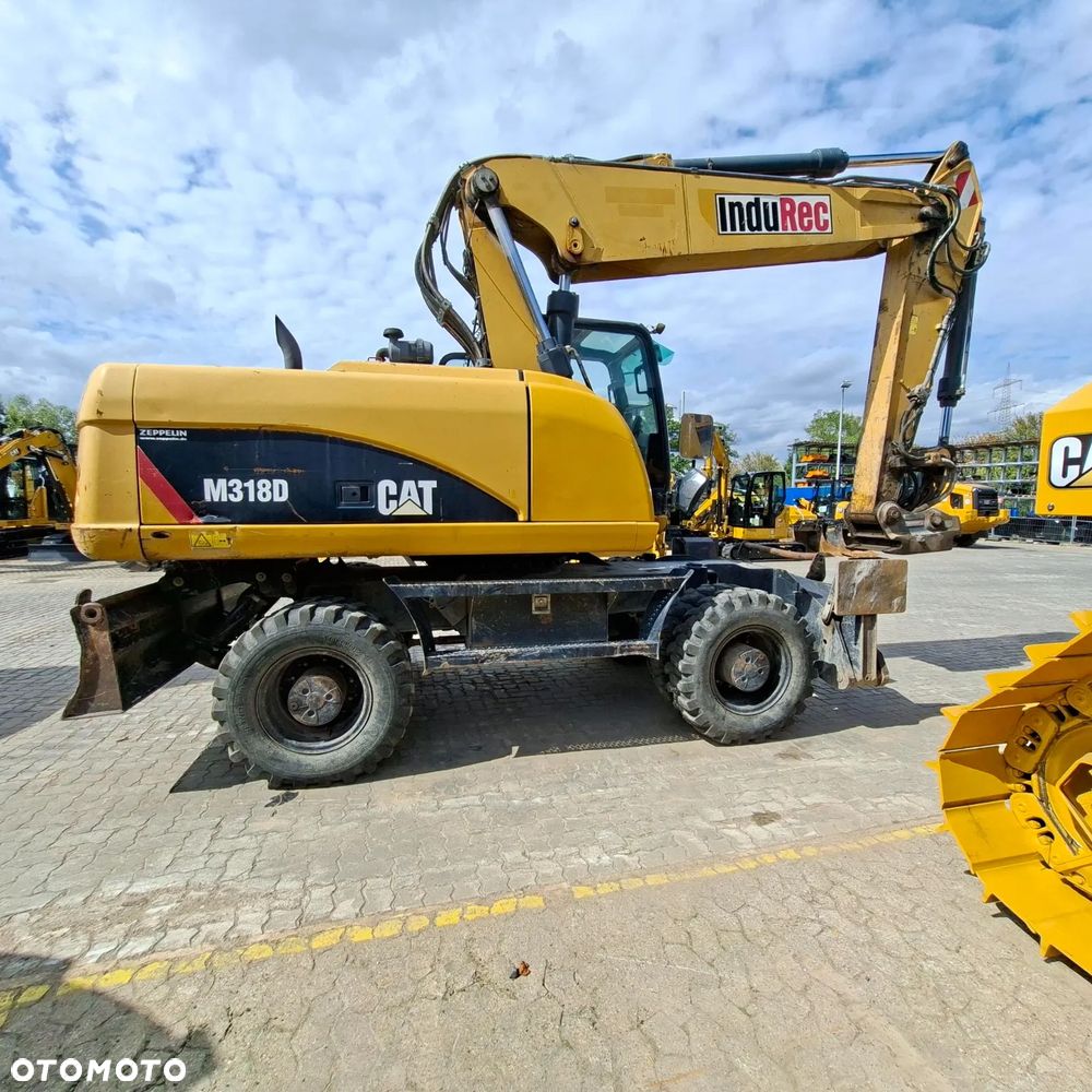 Caterpillar M318D, 2014 ROK, PODPORY + PŁUG - 2