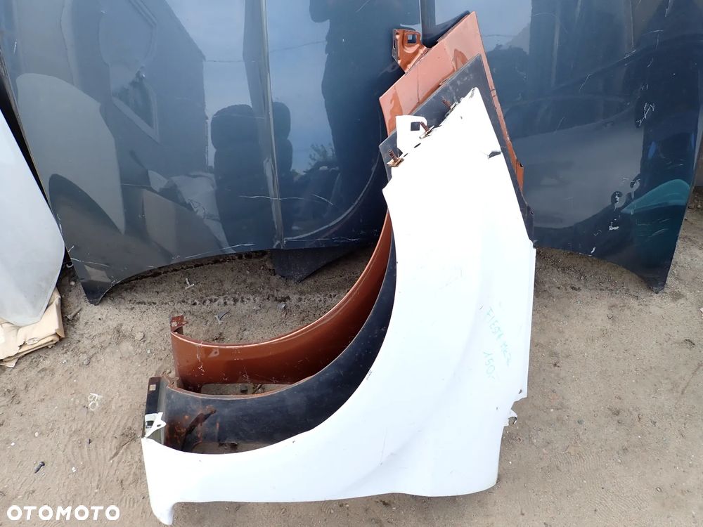 FORD FIESTA MK7 BŁOTNIK LEWY PRZÓD - 1